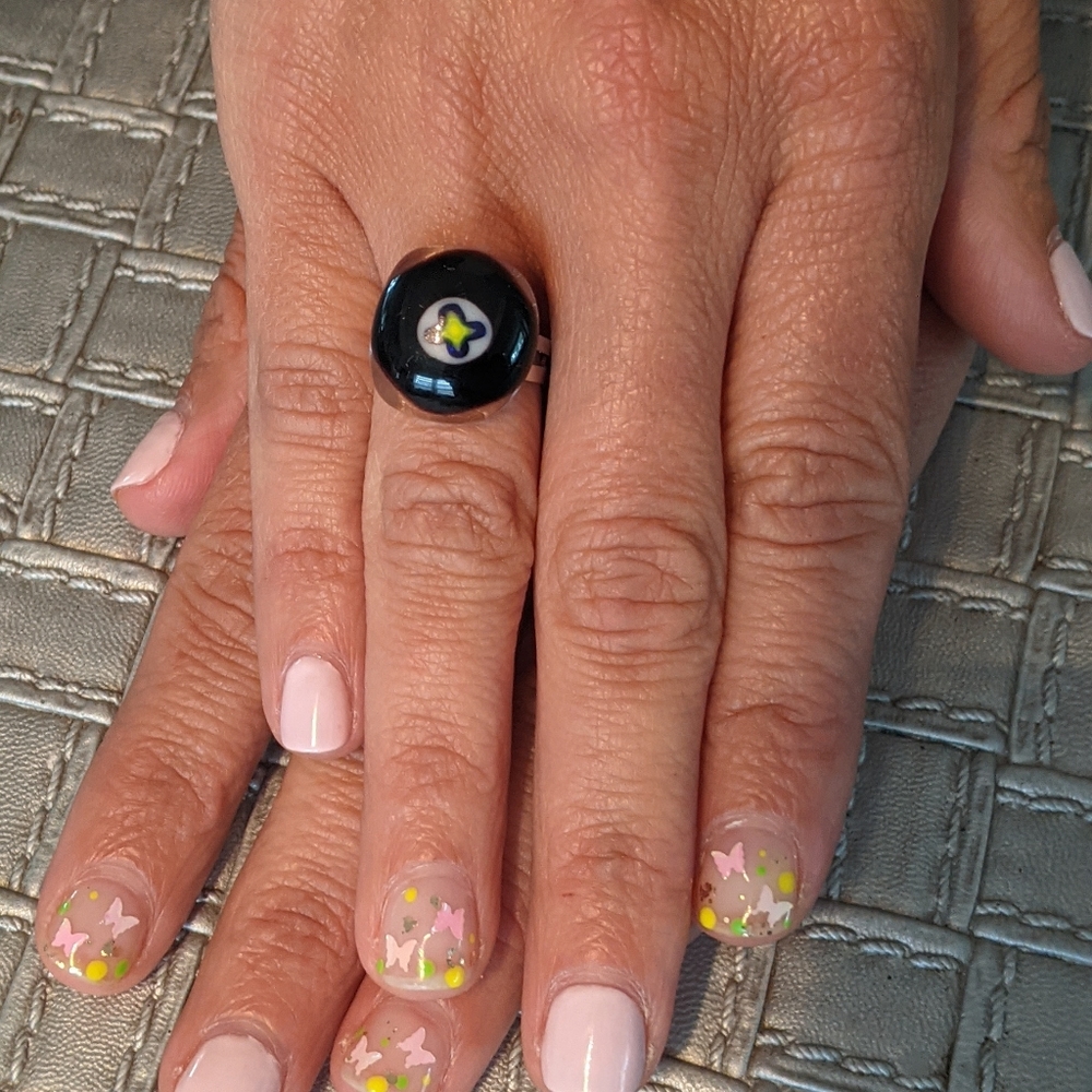 Artisan Handmade flower adjustable medium size silver plated ring.